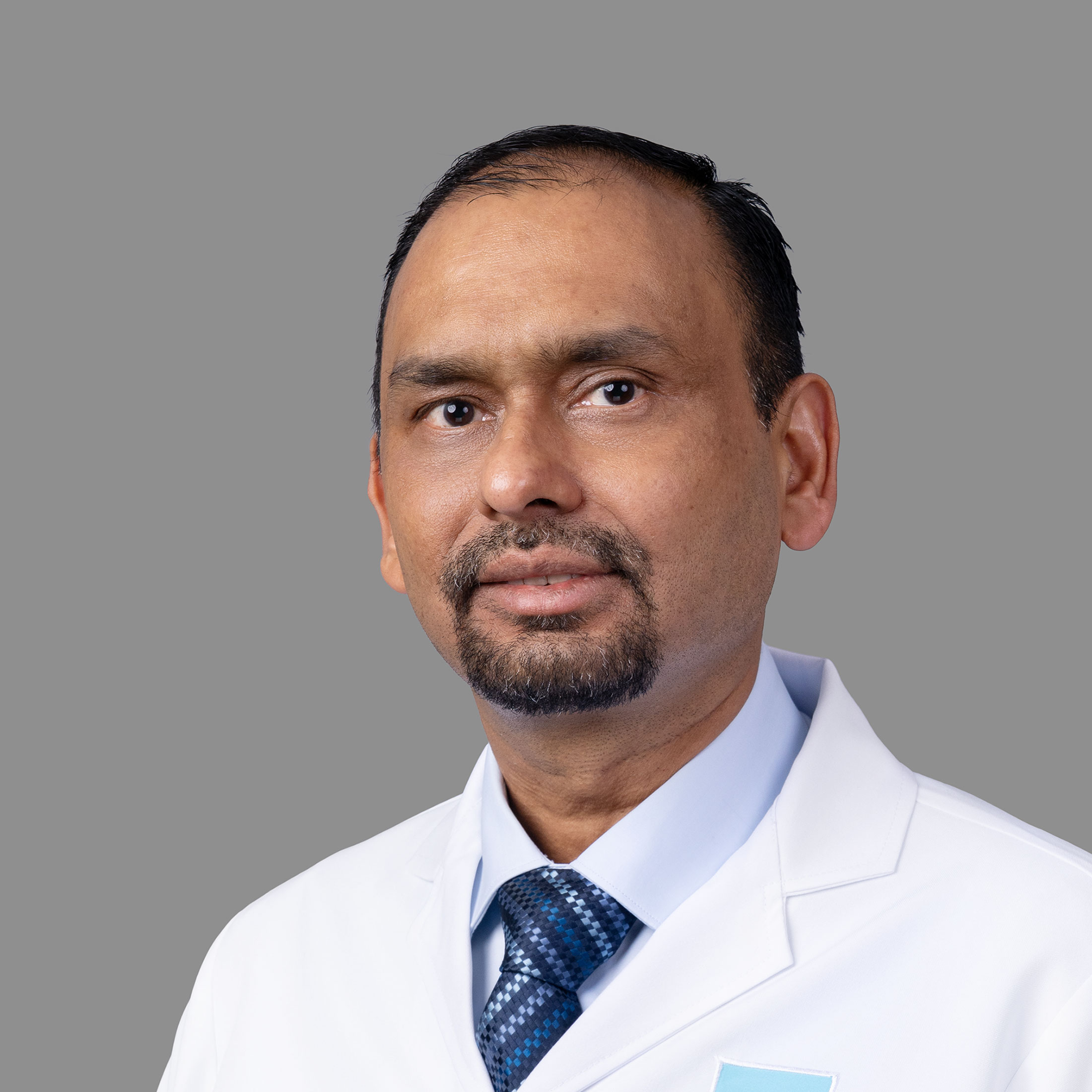 Dr. Amrit Bhushan Saxena