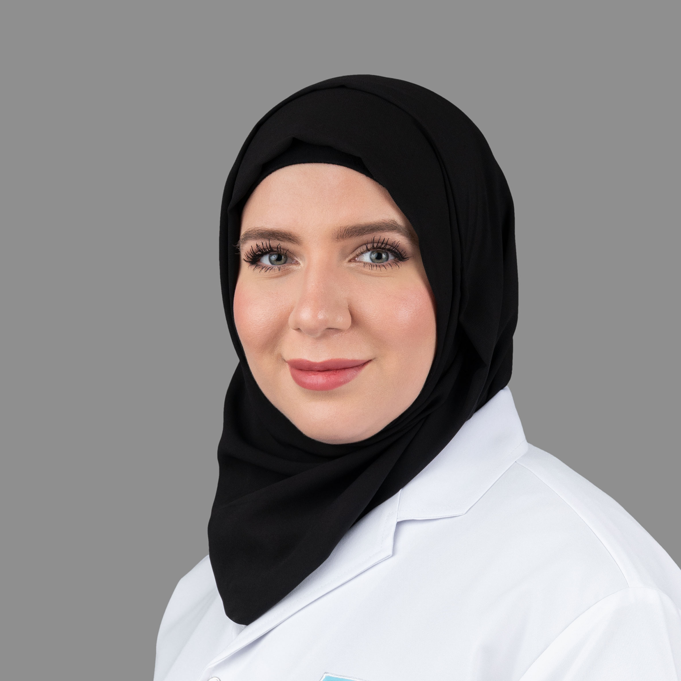 Dr. Iman Adam Abdul Halim